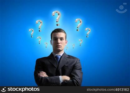 Problem solving. Image of confident businessman with arms crossed on chest