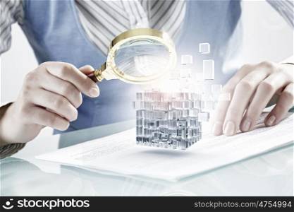 Process of new technologies integration. Hands of woman looking in magnifier at 3d illustration cube figure