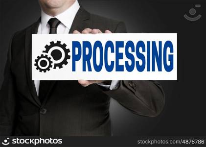 processing only sign is held by businessman. processing only sign is held by businessman.