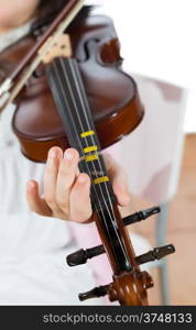 Prodigy playing the violin in the school of music