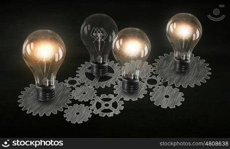 Producing energy. Glowing light bulbs and gears mechanism on dark background