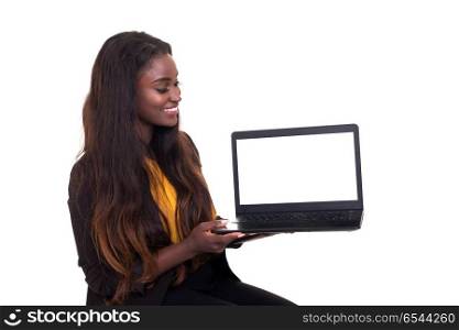 Product presentation. Young african woman presenting your product on a laptop computer