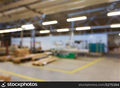 production, manufacture and industry concept - blurred factory workshop background. blurred factory workshop background