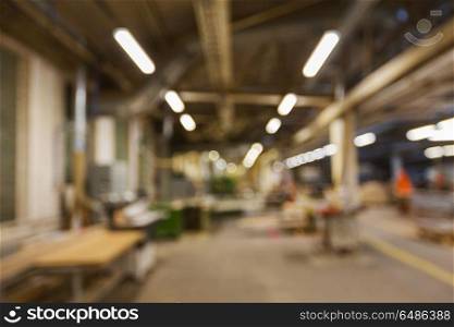 production, manufacture and industry concept - blurred factory workshop background. blurred factory workshop background. blurred factory workshop background