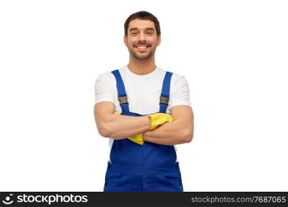 profession, cleaning service and building concept - happy smiling male worker or cleaner in overall and gloves over white background. happy male worker or cleaner in overall and gloves