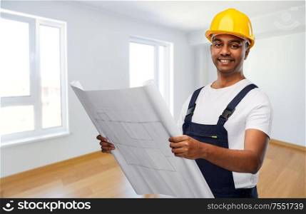 profession, construction and building concept - happy smiling indian builder or repairman in helmet with blueprint over empty room background. happy indian builder in helmet with blueprint