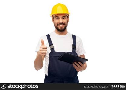 profession, construction and building - happy smiling male worker or builder in yellow helmet and overall with tablet pc computer showing thumbs up over white background. worker or builder with tablet pc showing thumbs up