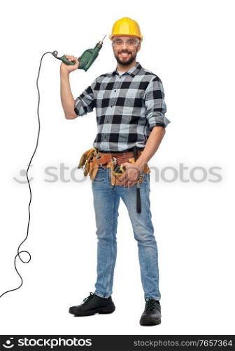 profession, construction and building - happy smiling male worker or builder in helmet and goggles with drill over white background. happy male worker or builder in helmet with drill