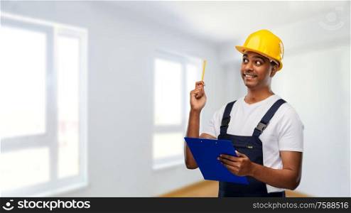 profession, construction and building - thinking indian worker or builder in helmet with clipboard and pencil having idea over empty room at new home or apartment background. builder with clipboard and pencil having idea