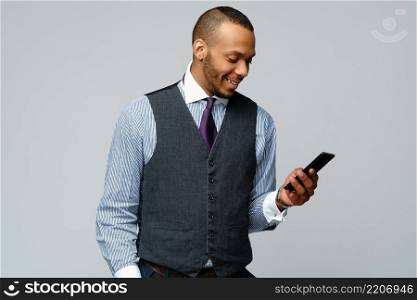 professional african-american business man talking on mobile cell phone. professional african-american business man talking on mobile phone