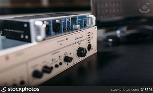 Professional audio engineering equipment, closeup. Sound, radio or music studio instrument