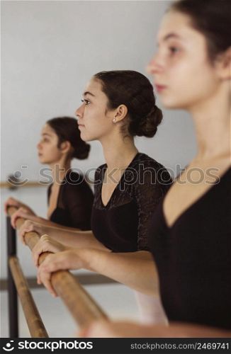 professional ballerinas rehearsing leotards