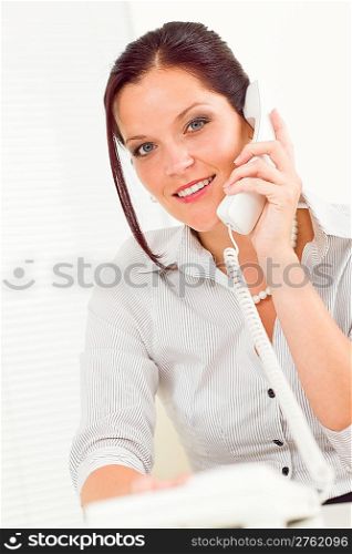 Professional businesswoman attractive calling on phone close-up portrait