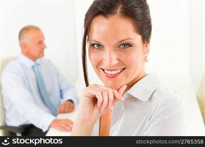 Professional businesswoman attractive smiling portrait in office