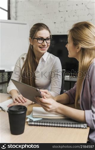 professional businesswomen discussing business strategy