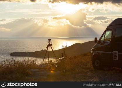 Professional camera taking picture film video of sunrise over sea surface, Greece Peloponnese Mani Peninsula.. Camera taking picture film of sunrise over sea surface