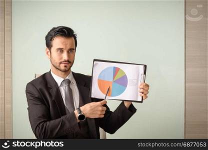 professional caucasian businessman present financial performance chart