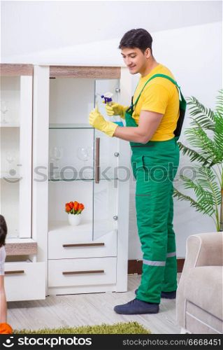 Professional cleaning contractor working at home