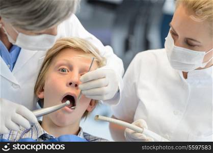 Professional dentist assistant checkup teeth teenager patient boy dental surgery