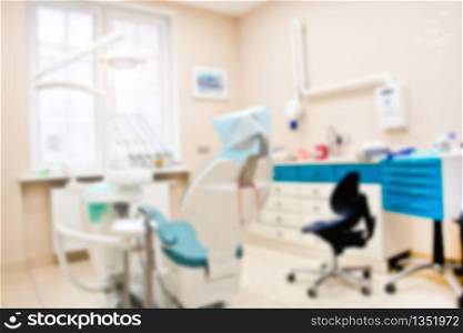 Professional Dentist tools in the dental office. Dental Hygiene and Health conceptual image. Blurred image.