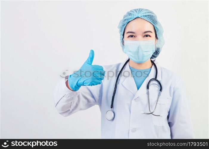 Professional doctors give big thumbs up gesture on white background to patients who treated at hospital or clinic to assure will get well soon. Medical personnel and health people concept. Copy space
