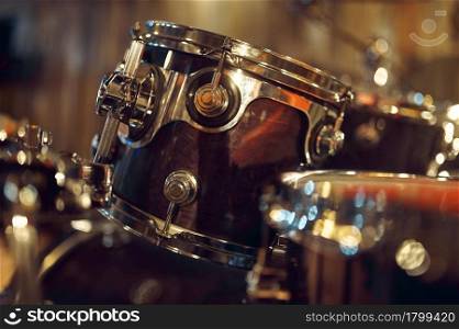 Professional drum kit closeup, nobody. Rock band concert repetition, live sound performing concept, percussion musical instrument, drum-set. Drum kit closeup, percussion musical instrument