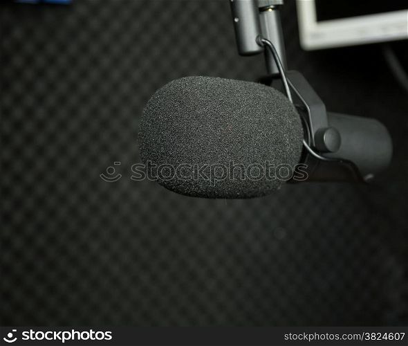 Professional dynamic microphone in recording studio