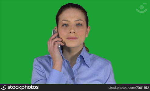 Professional female has a phone conversation (Green Key(