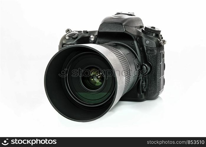 Professional generic DSLR camera isolated on white background in close-up (HDR effect)