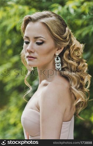 Professional hair dressing.. Large portrait of the girl with a beautiful hairdress 3374.