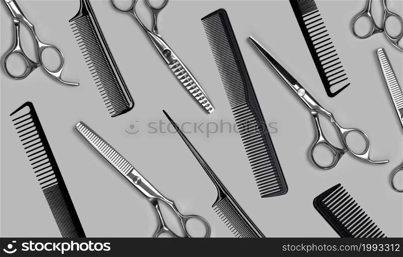 Professional Haircutting Scissors. and hairbrush Studio isolation on grey
