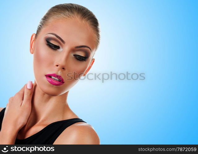 Professional Make up concept. Portrait of young beautiful woman with beauty makeup and perfect skin. on color background