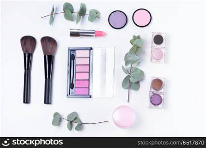 Professional makeup tools. Professional makeup tools with beauty products, flat lay on white background