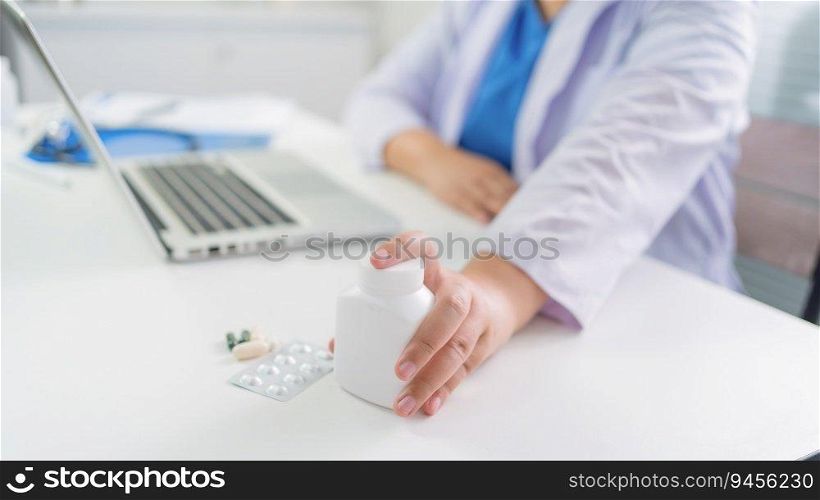 Professional medical doctor hand giving medicine. protect against coronavirus COVID-19 medicine healthcare concept doctor giving pills to patient.