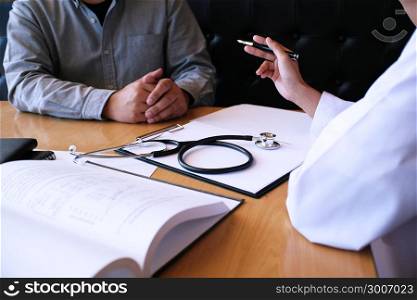 Professional medical doctor in white uniform gown coat interview consulting patient.