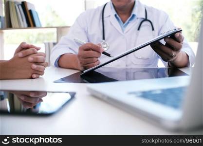 Professional medical doctor in white uniform gown coat interview consulting patient.