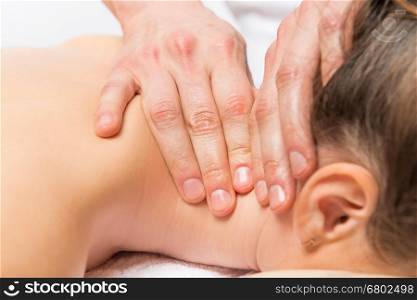 professional neck massage on the massage table
