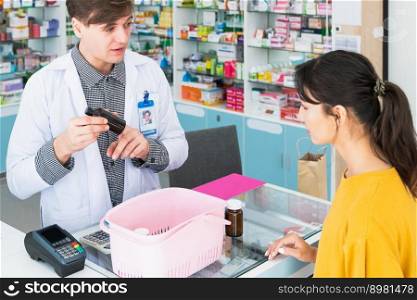 Professional pharmacist advise or explain property of qualified medical product to customer in pharmacy, druggist answer to client healthcare inquiry, medical service and consultation concept.. Pharmacist advise or explain property of qualified medical product to customers.