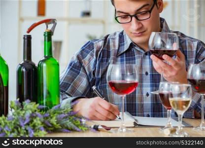 Professional sommelier tasting red wine . The professional sommelier tasting red wine