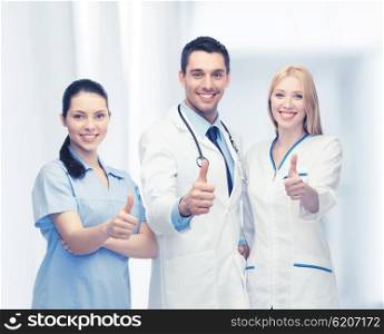 professional young team or group of doctors showing thumbs up. professional young team or group of doctors