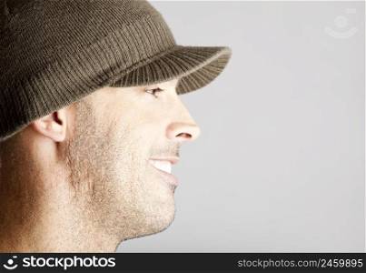 Profi≤portrait of a young man isolated on a gray background