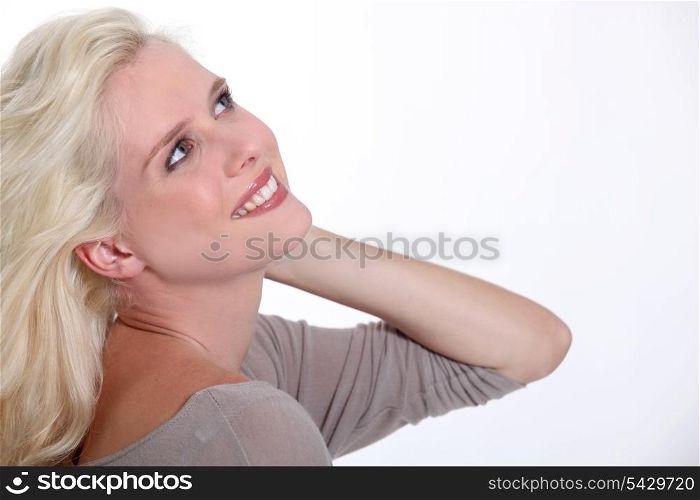 Profile of happy blond woman
