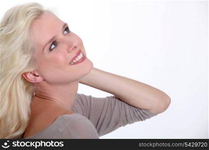 Profile of happy blond woman