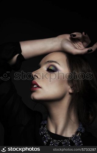 Profile of Pensive Woman with Closed Eyes