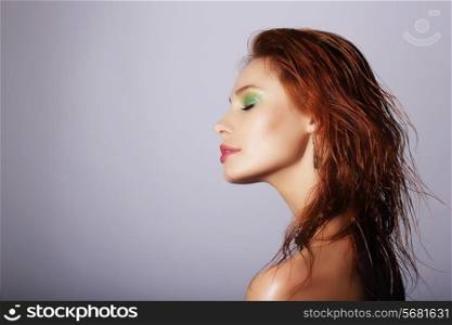Profile of Seductive Redhead Woman with Wet Hair