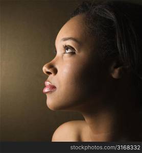 Profile of serious African-American young adult female.