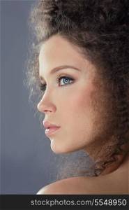 Profile of Young Brunette Fashion Model with Frizzy Hair