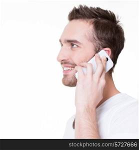 Profile portrait of happy man calling by mobile in casuals - isolated on white. Concept communication.&#xA;