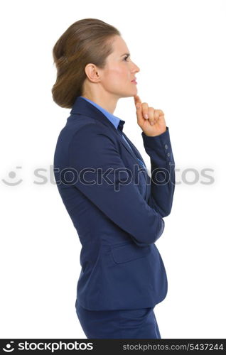 Profile portrait of thoughtful business woman