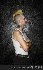 Profile shot of mid-adult Caucasian male punk.